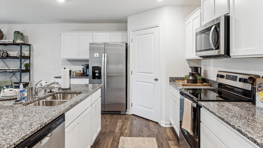New appliances included in our larger kitchen island area with seating anchor the kitchen, near dining, great rooms