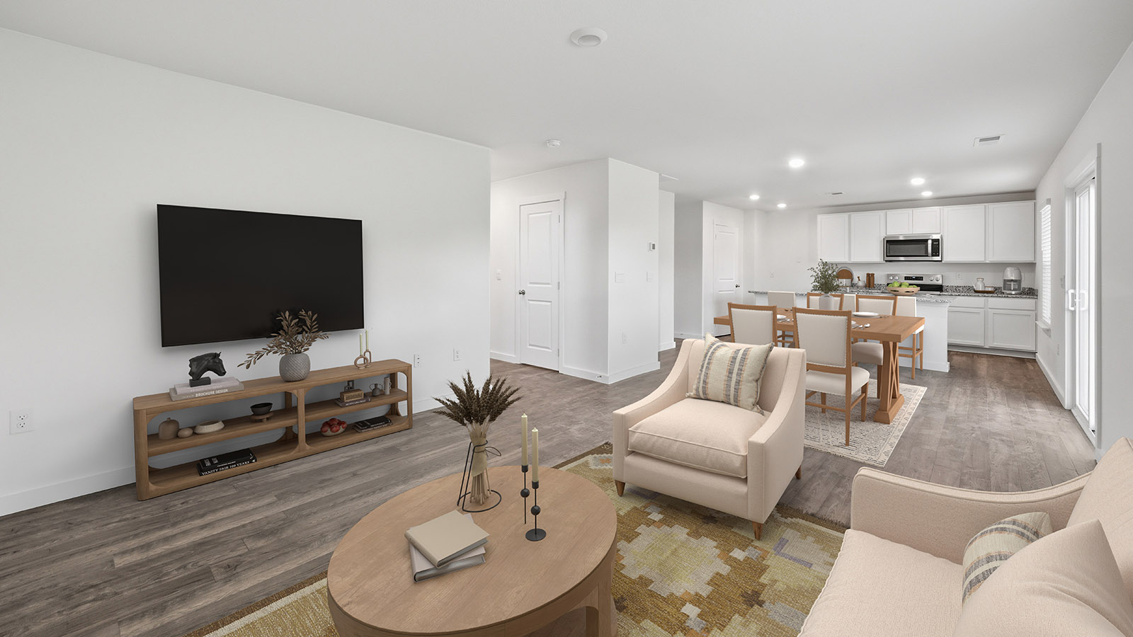 Open concept living, dining, and kitchen space