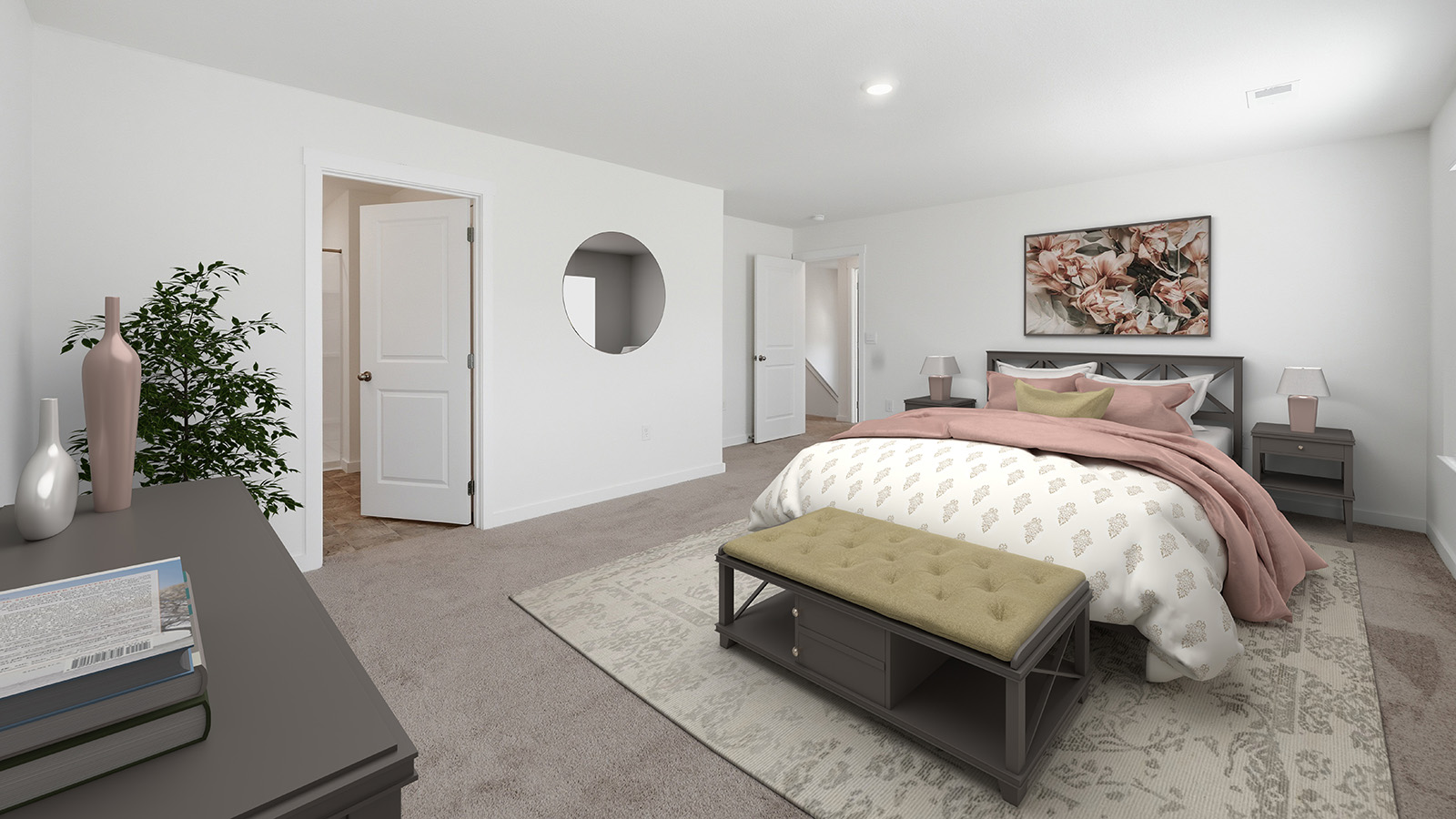 Primary bedroom with private attached bathroom and walk-in closet