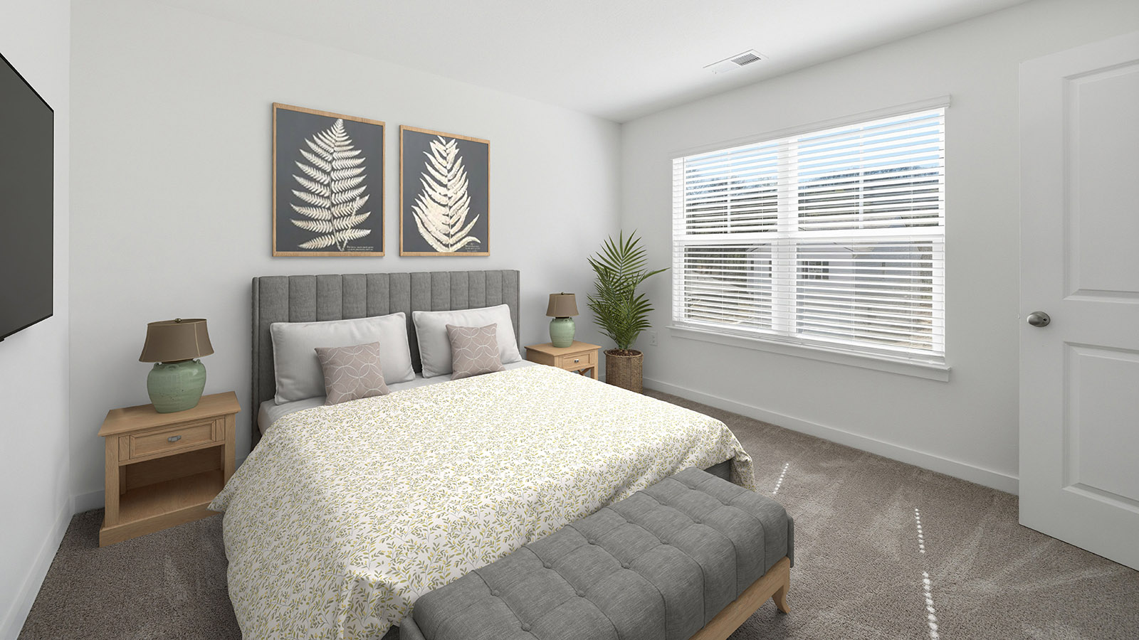 Bedroom with ample natural light and carpet floors