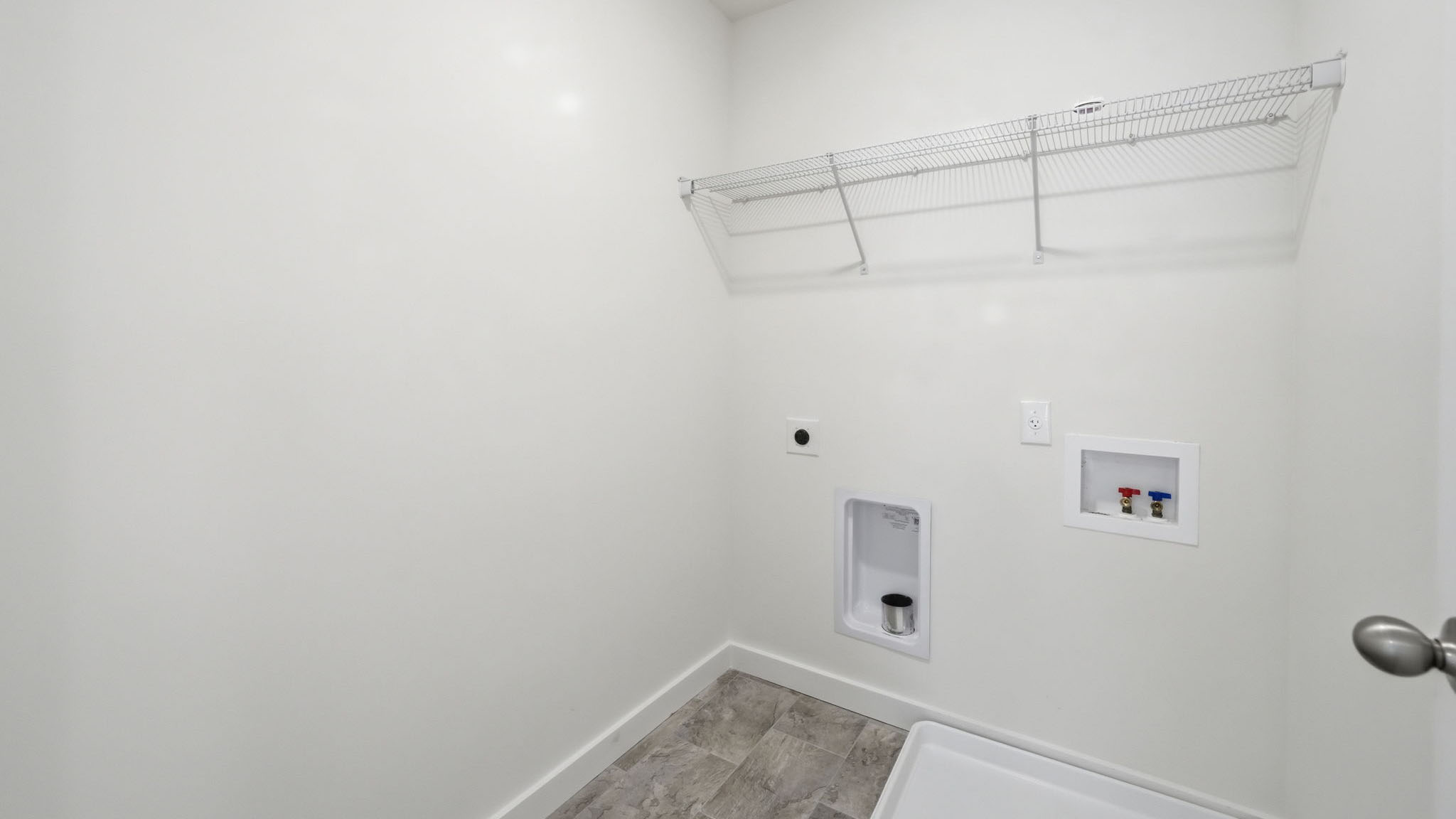 Laundry room with washer and dryer connections