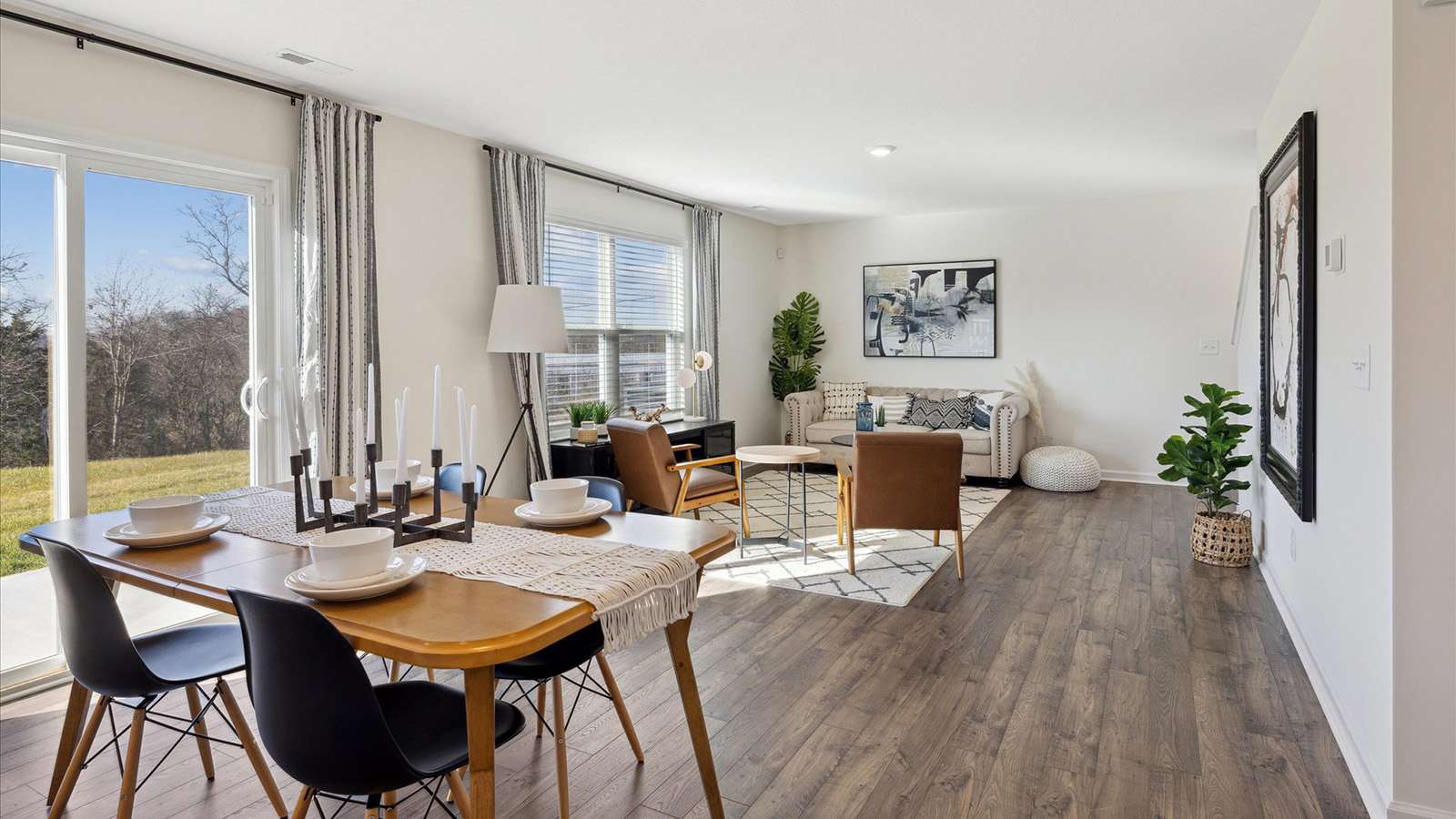 Open concept living, dining, and kitchen space