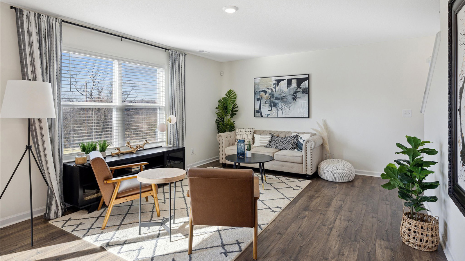 Open concept living, dining, and kitchen space