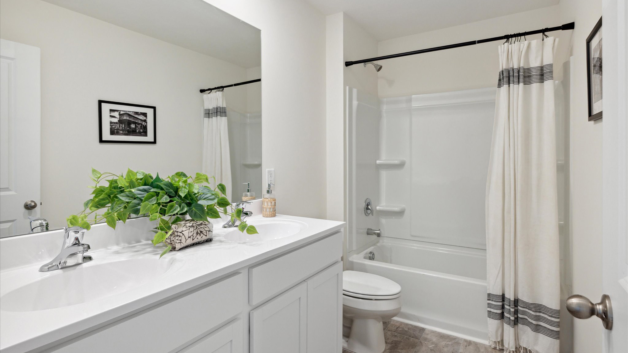 Bathroom with combination shower and bathtub