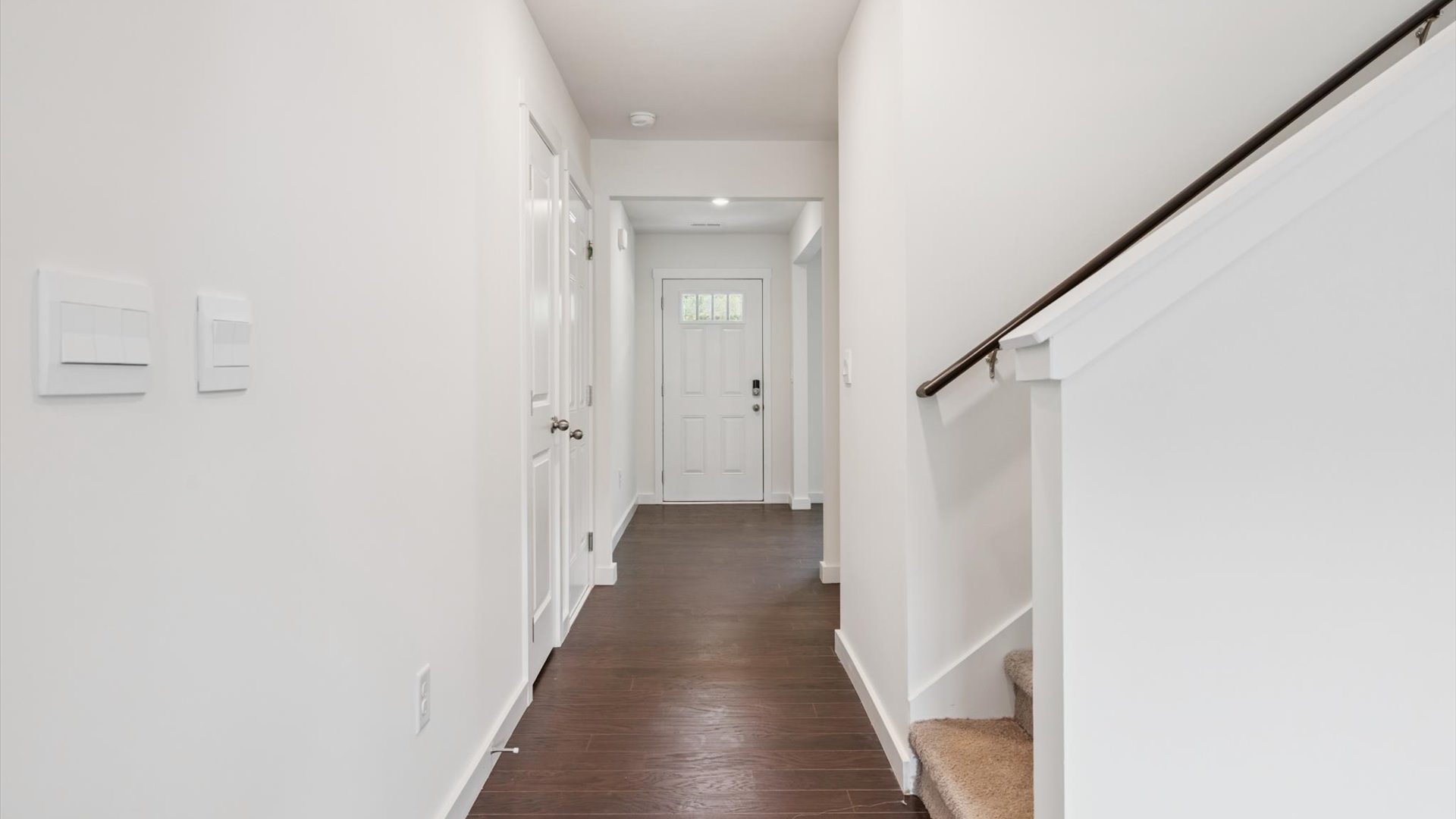 A foyer, entry hall inside front door, next to office, or sitting room adding a welcoming front, direct line of sight to home