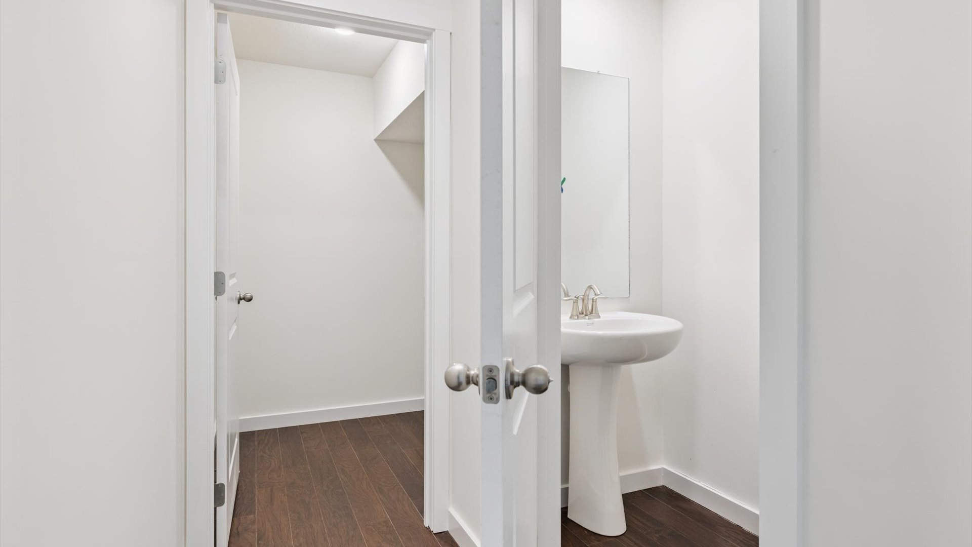 Second bath with built-in tub-shower combo, vanity, sink, lighting, stylish finishes in Emory Creek