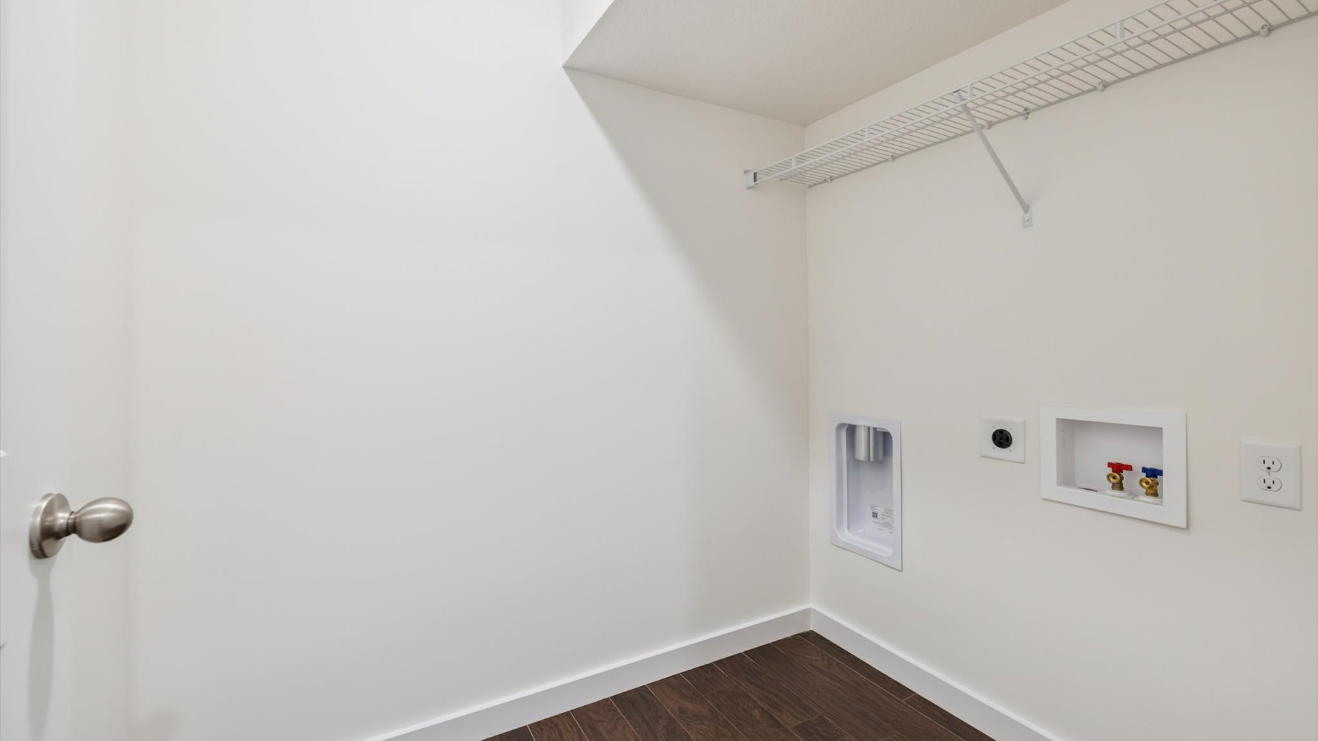 Emory Creek utility laundry smartly designed with overhead organized storage, a drop zone, with new washer, dryer included