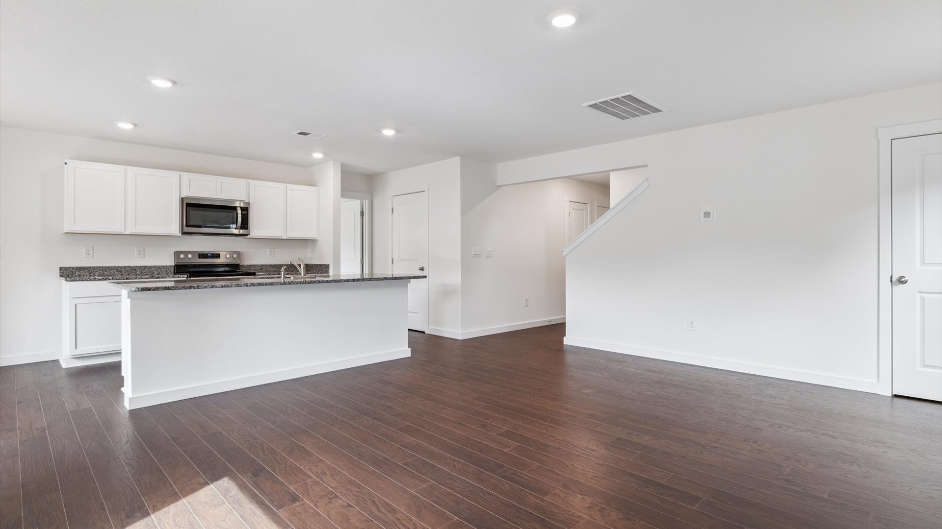 New appliance suite included, our larger kitchen island with seating anchor the kitchen, next to dining, great rooms, pantry