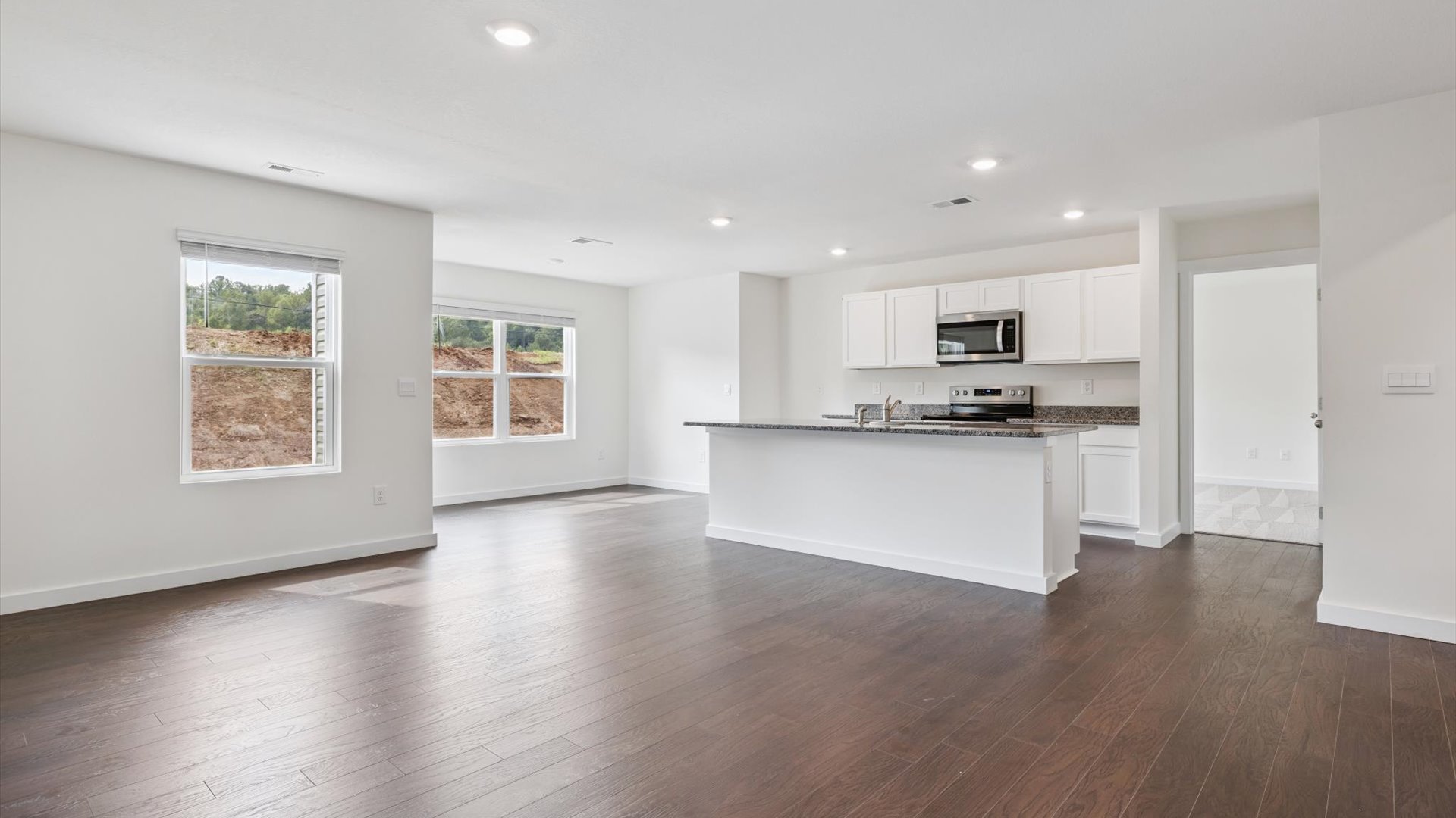 Central kitchen island with sink, seating, crafted to anchor the home, pantry, prep zones, perfect for entertaining and everyday gathering