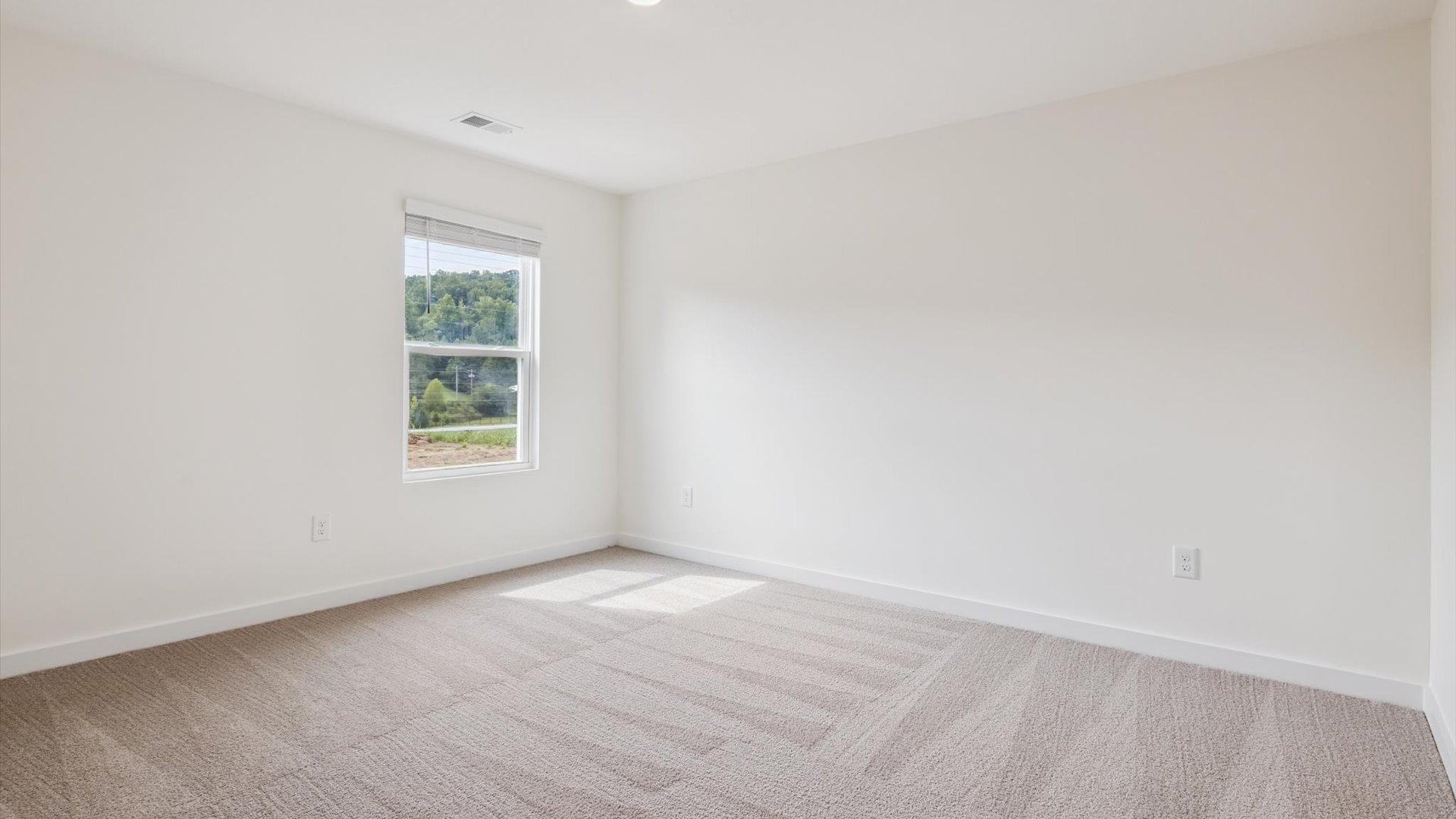 Primary bedroom designed with privacy and space in mind, a flow into a spa-inspired ensuite, walk-in closet on main level