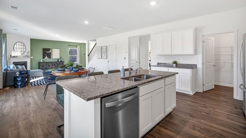 catlett-cove-green-model-kitchen-living-room