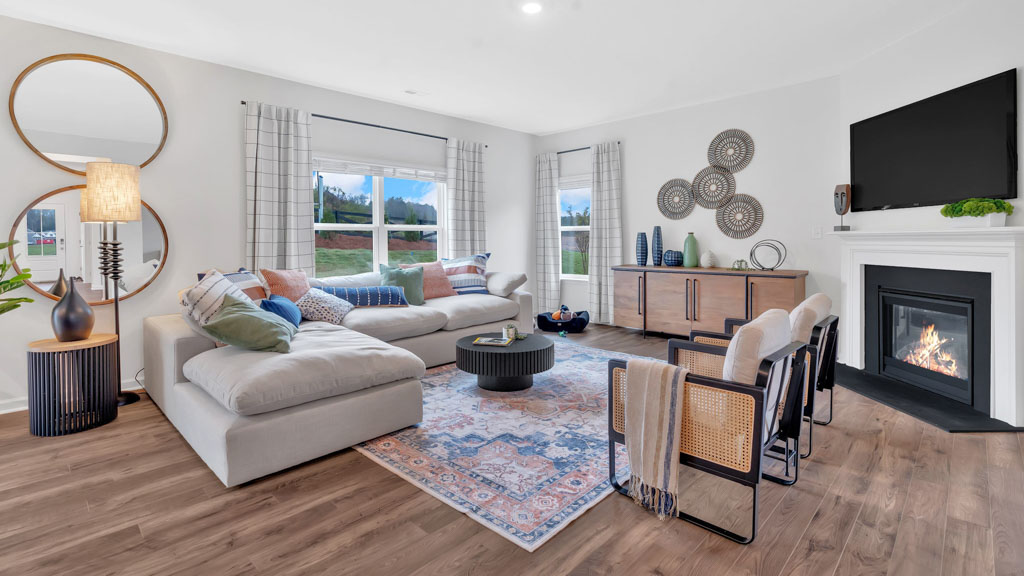 Open concept living, dining, and kitchen space