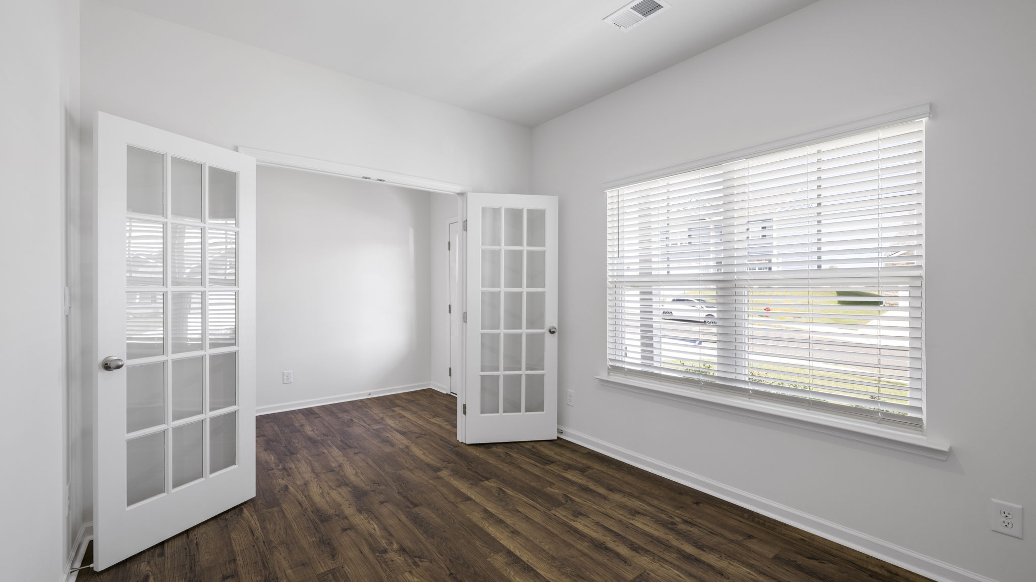 Office and front room space with private french doors
