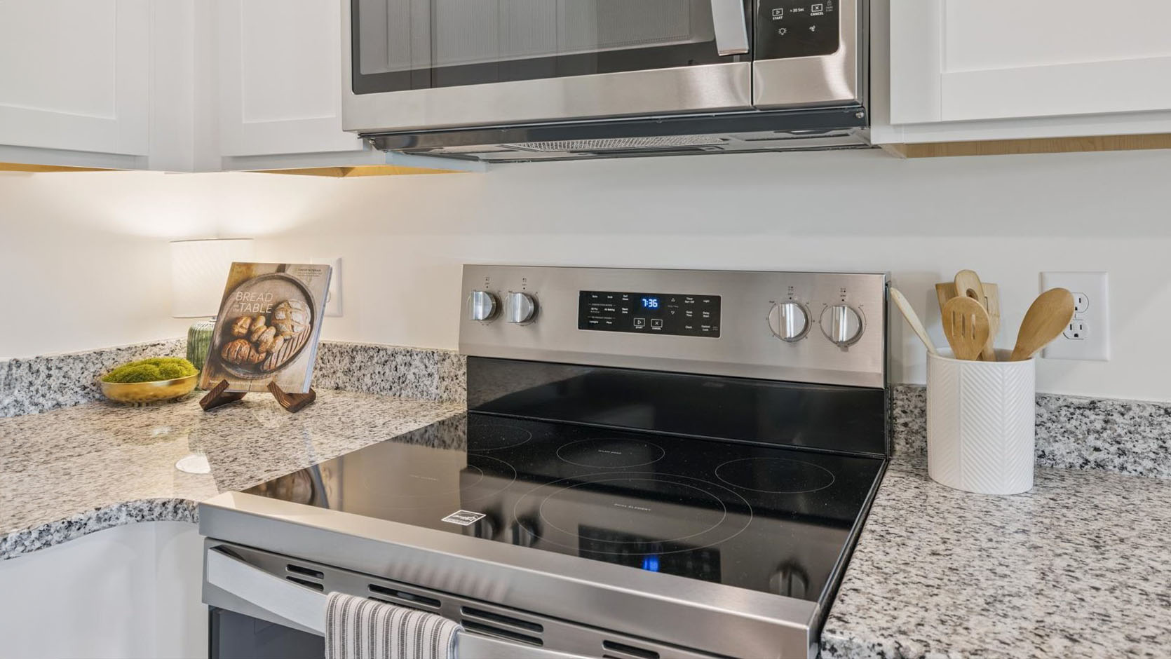 Open concept living, dining, and kitchen space