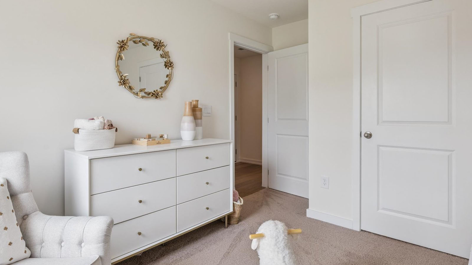 Bedroom with ample natural light and carpet floors