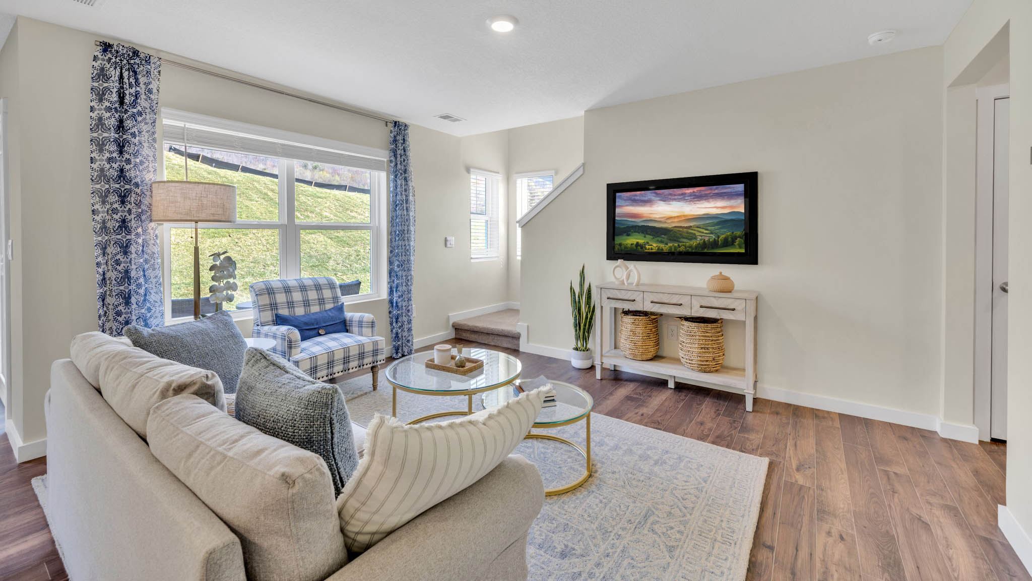 Open concept living, dining, and kitchen space