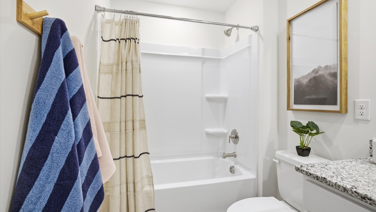 Bathroom with combination shower and bathtub