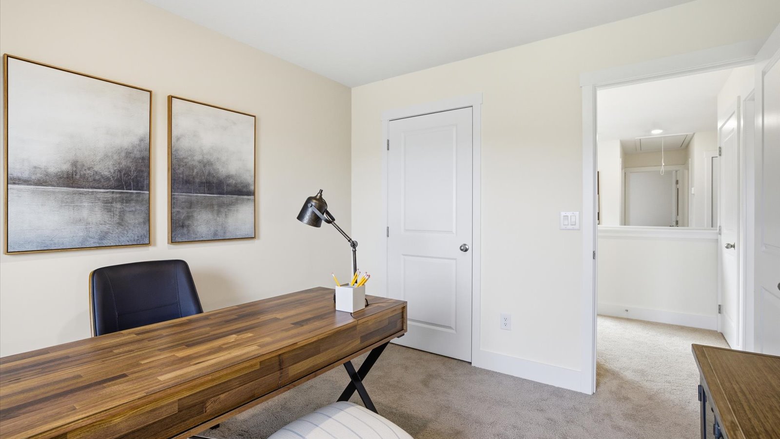 Bedroom with ample natural light and carpet floors