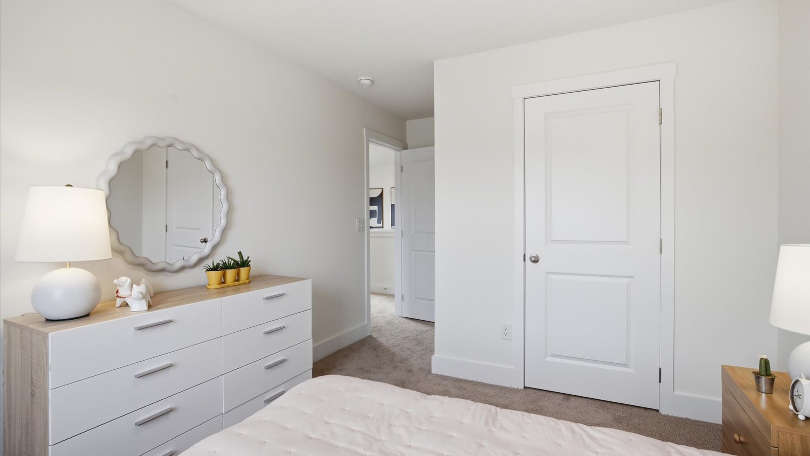 Bedroom with ample natural light and carpet floors