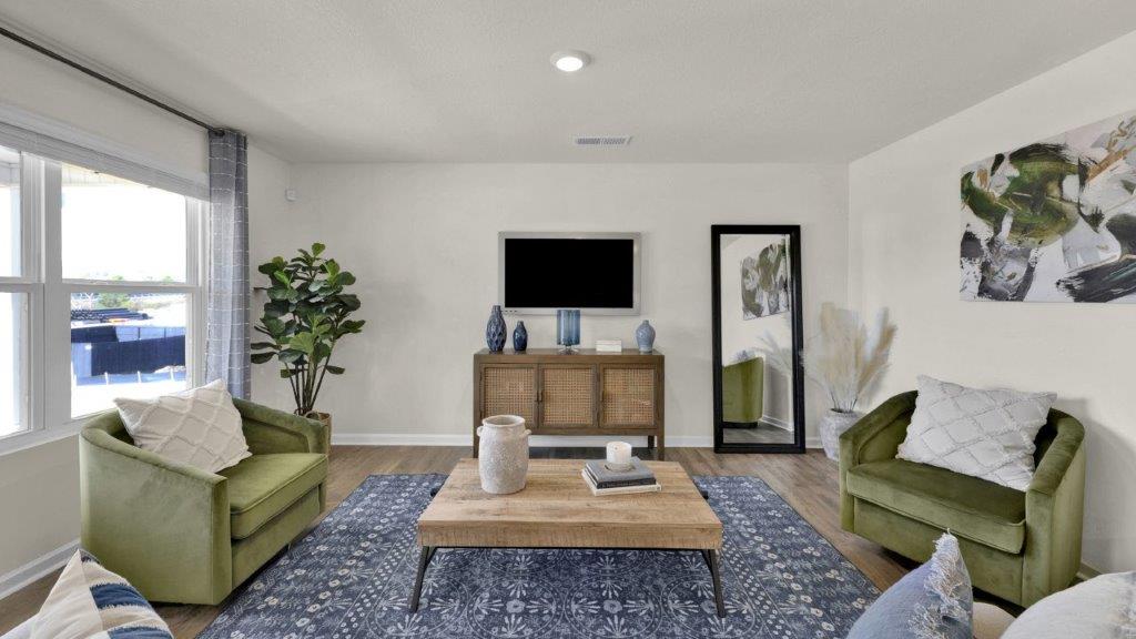 Open concept kitchen, living, family, and dining room space