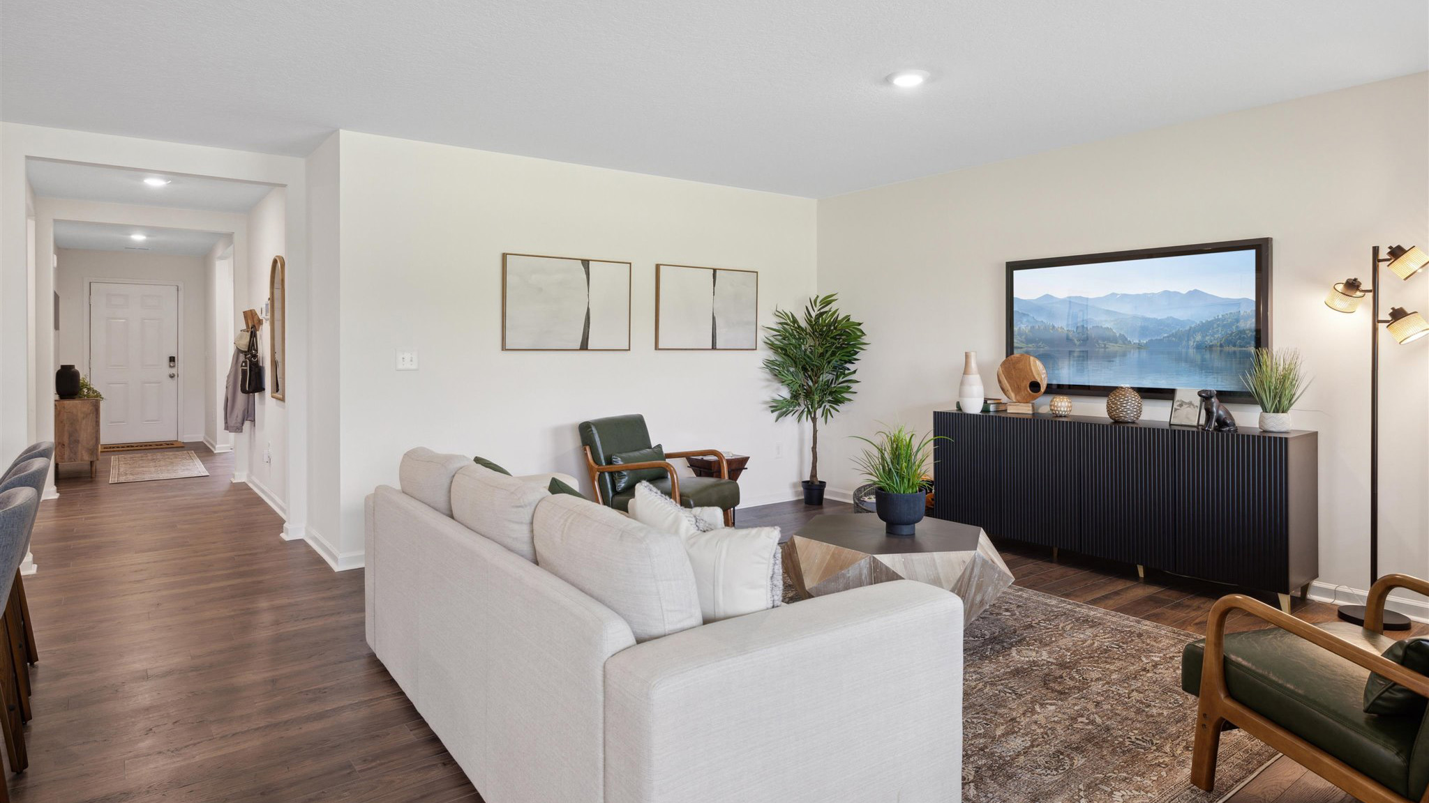 Open concept living, dining, and kitchen space