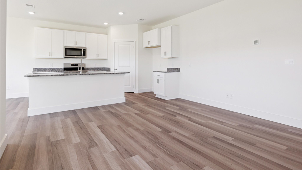Spacious open kitchen overlooking  living space