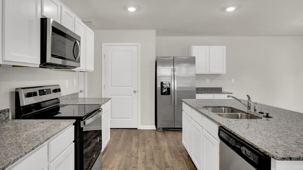 New appliances included in our larger kitchen island area with seating anchor the kitchen, near dining, great rooms