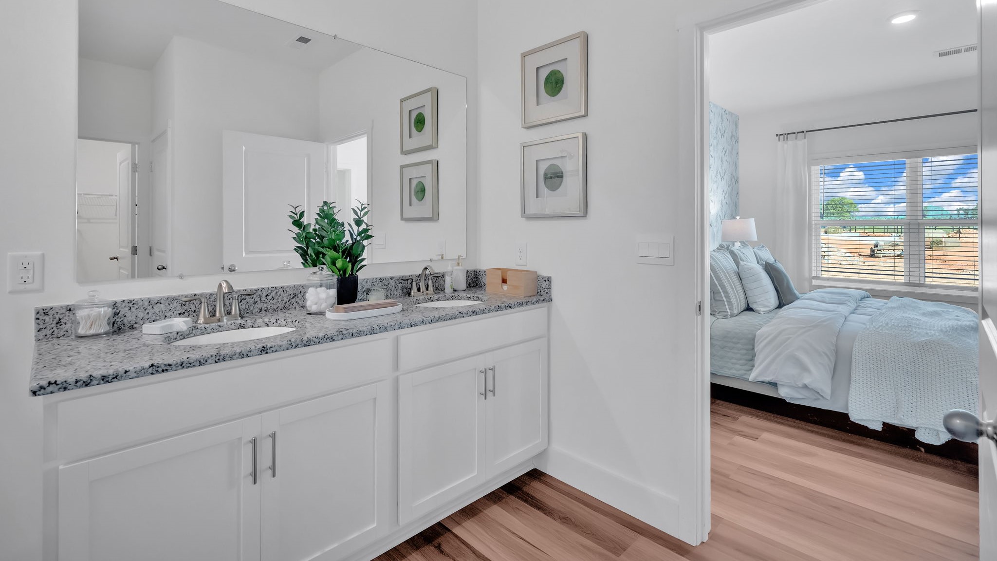 Private attached primary bathroom with built in vanity