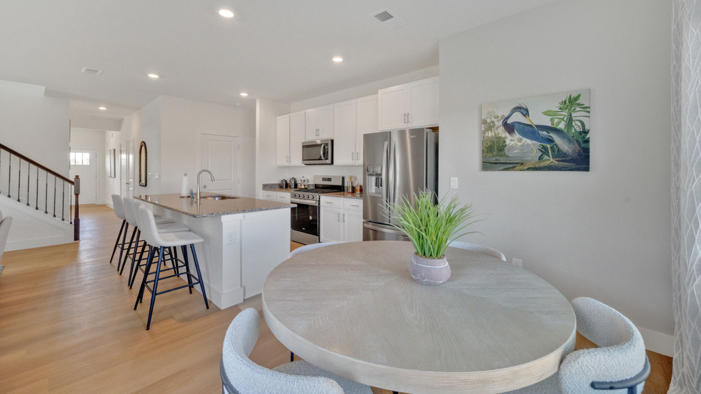 View from kitchen to the living and, backyard areas, delivering our open designs at Price's Point