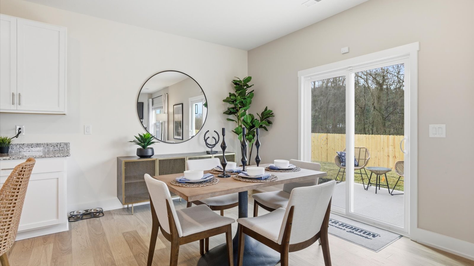 Open concept living, dining, and kitchen space