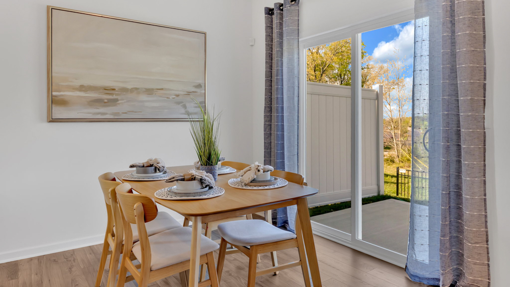 Open dining room space adjacent to kitchen