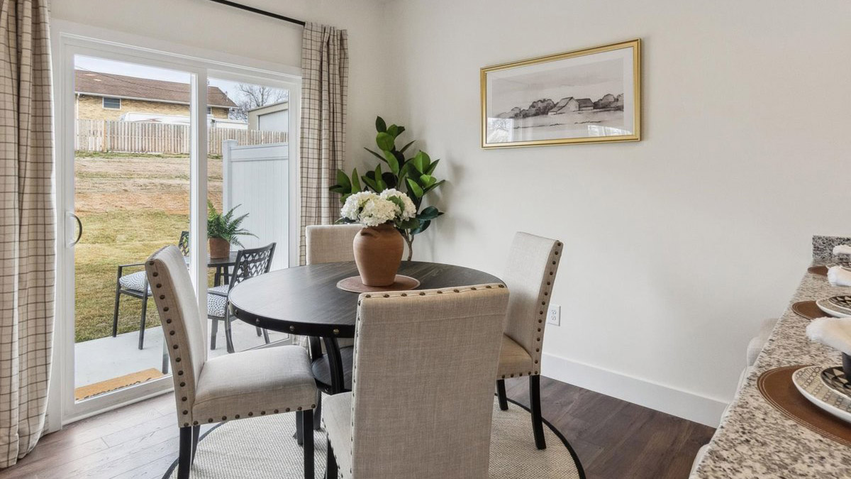 Open dining room space adjacent to kitchen