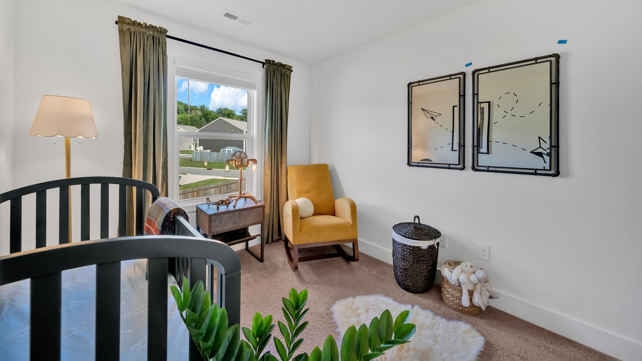 Bedroom with ample natural light and carpet floors