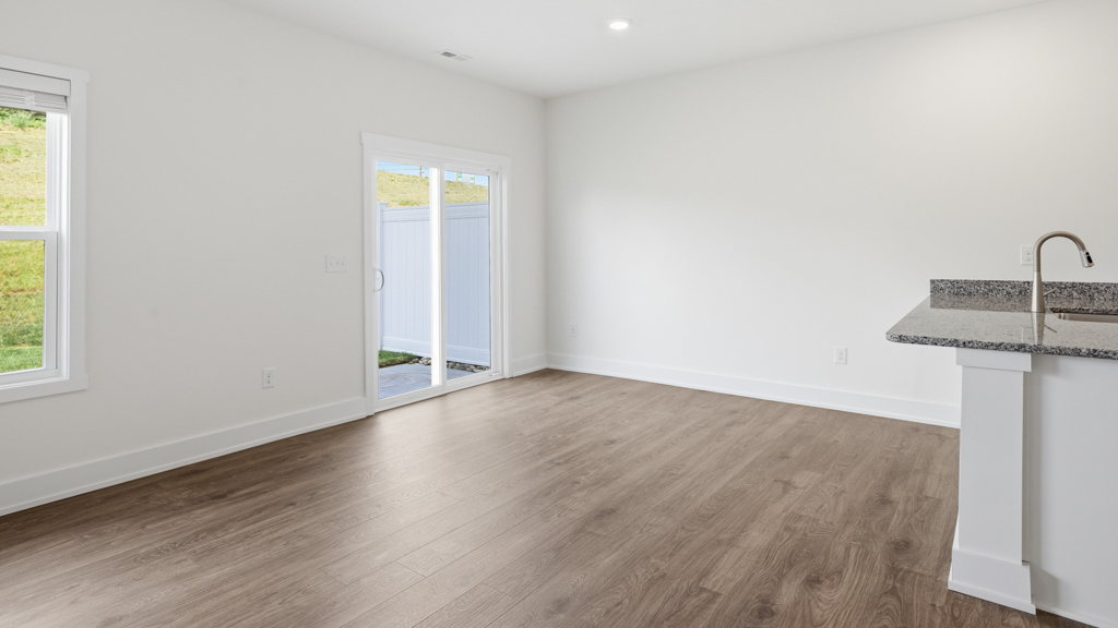 Open dining room space adjacent to kitchen