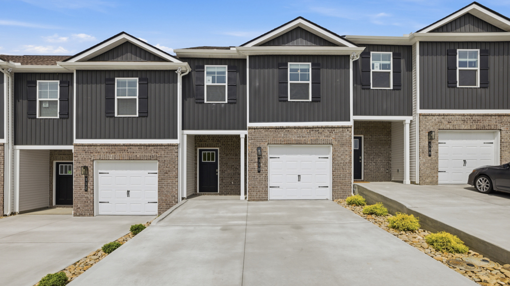 Front exterior of traditional two story townhome