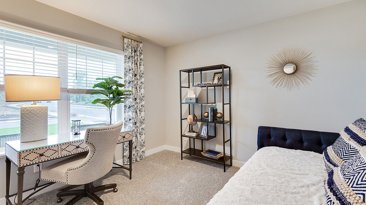 Main level bedroom with double doors.