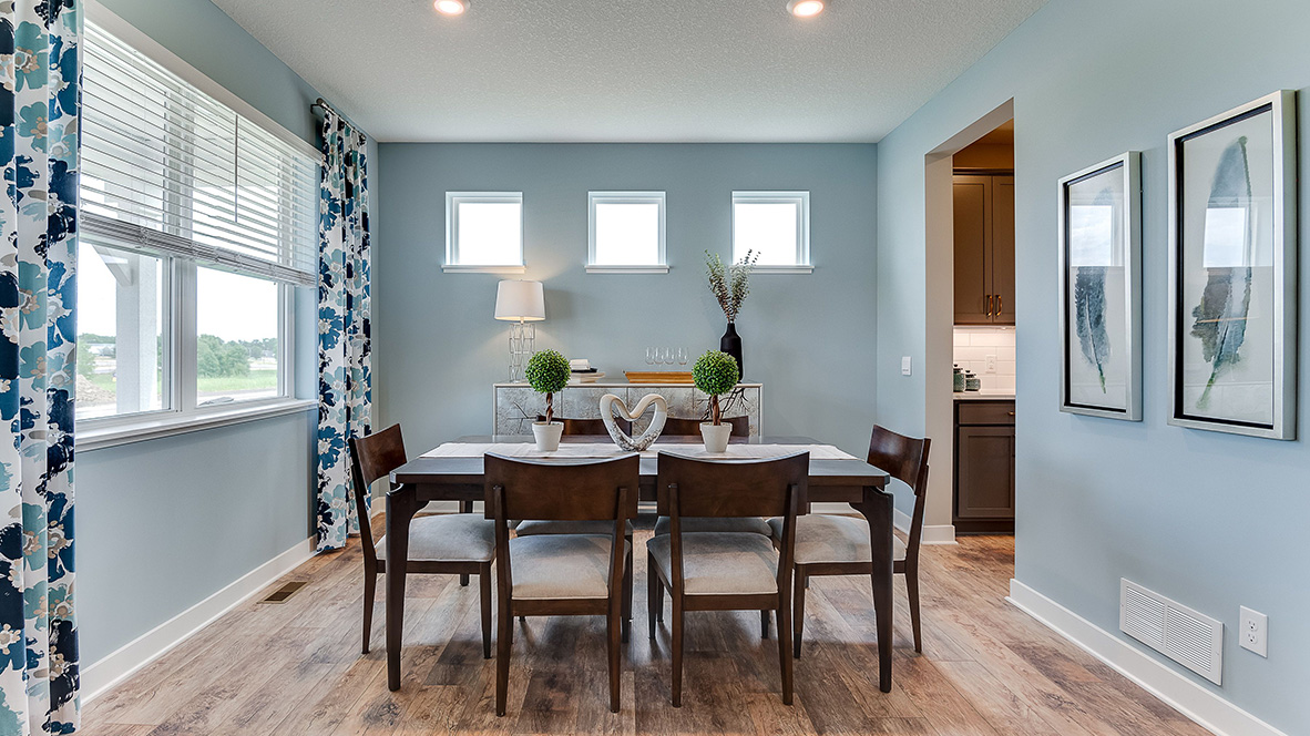 Formal dining room with dining table seating six.