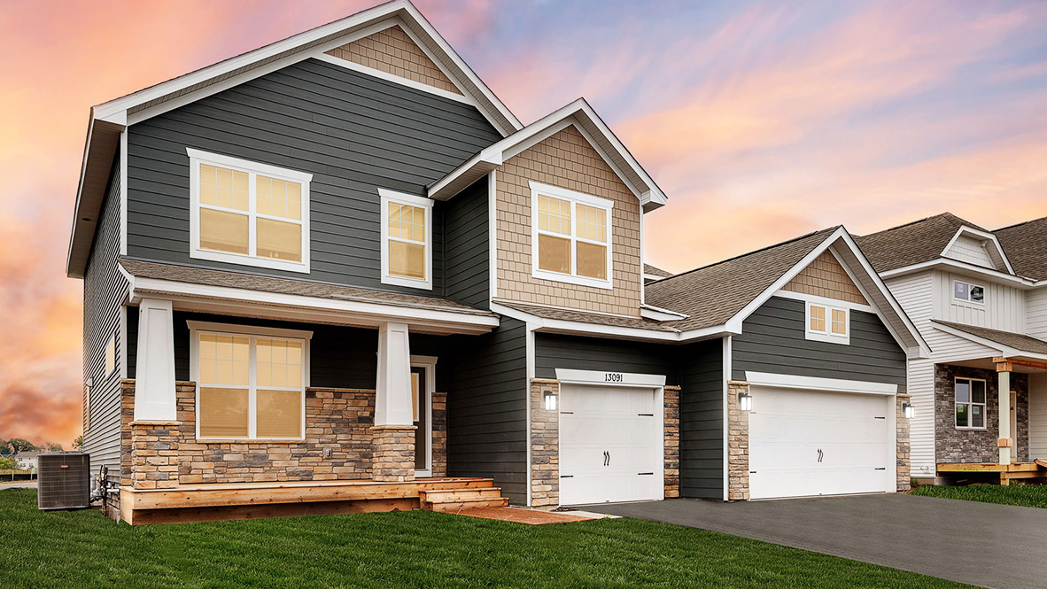 Stunning exterior elevation shown at dusk.