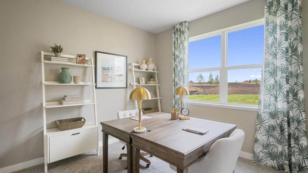 Main level study, bedroom or den.