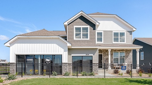 Street view of Jordan model home at Copper Hills by D.R. Horton new construction neighborhood.