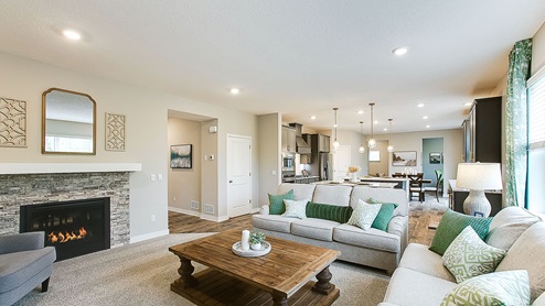 The redwood family room with a double sided fireplace.