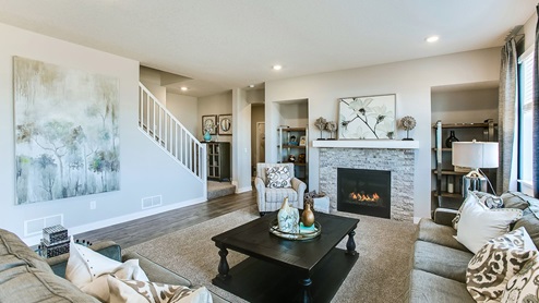 Jordan family room with gas fireplace.