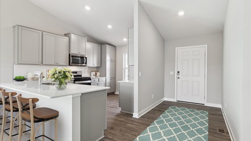 Foyer and kitchen.