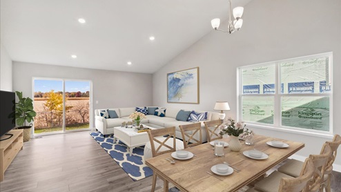 Open main level with vaulted ceilings.