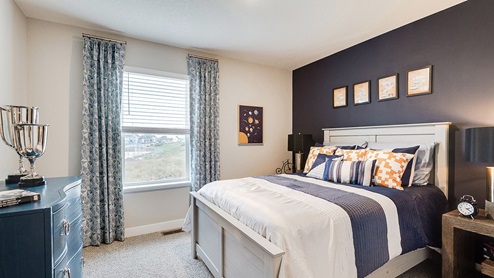 Secondary bedroom on the upper level.