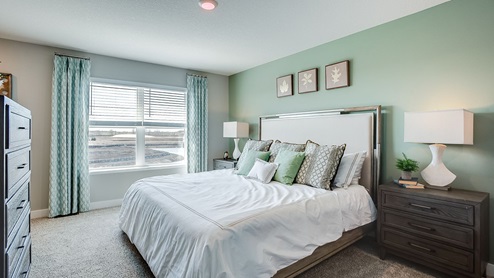 Luxury bedroom suite with private bath.