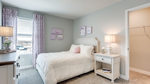 Secondary bedroom on the upper level.