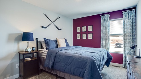 Secondary bedroom on the upper level.