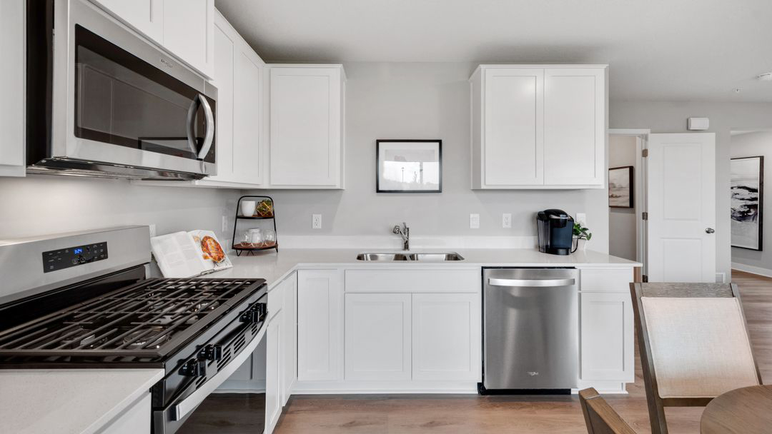 Kitchen with stainless appliances.