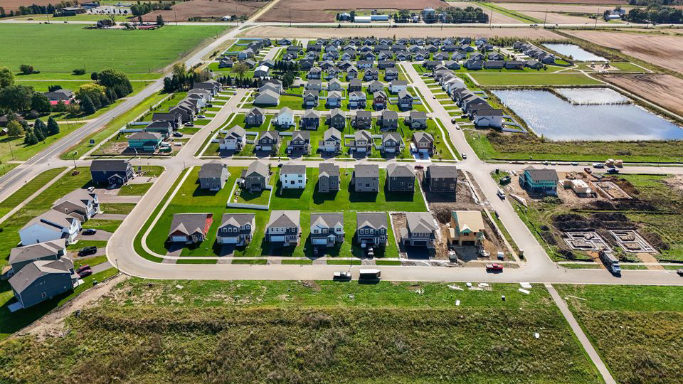 Aerial photos of homes for sale in Whispering Fields in Farmington, Minnesota.